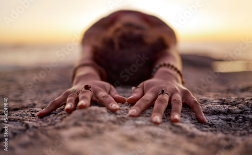 Yoga, pilates and beach hands with zen of a woman on ocean sand for chakra and wellness meditation. Training, exercise and spiritual mindset of a athlete at sunset and nature in Miami stretching