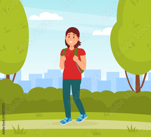 Young woman in casual clothes walking with backpack in park flat vector