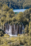 Beautiful view of waterfalls with crystal clear water in forest in The Plitvice Lakes National Park in Croatia Europe.
