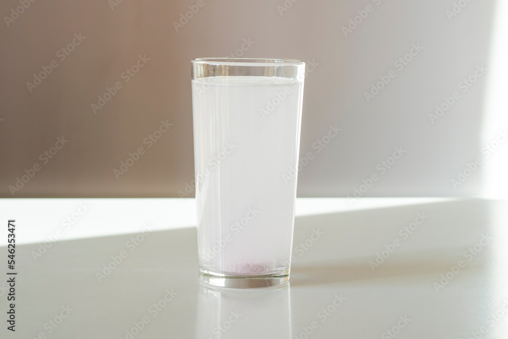 The electrolyte tablet is dissolved in water. Oral rehydration salts