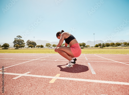 Fototapeta Naklejka Na Ścianę i Meble -  Tired, rest and woman athlete after running, sport and runner workout outdoor. Training fatigue of a fitness, sports run and body health exercise on a field in the summer sun for a track race