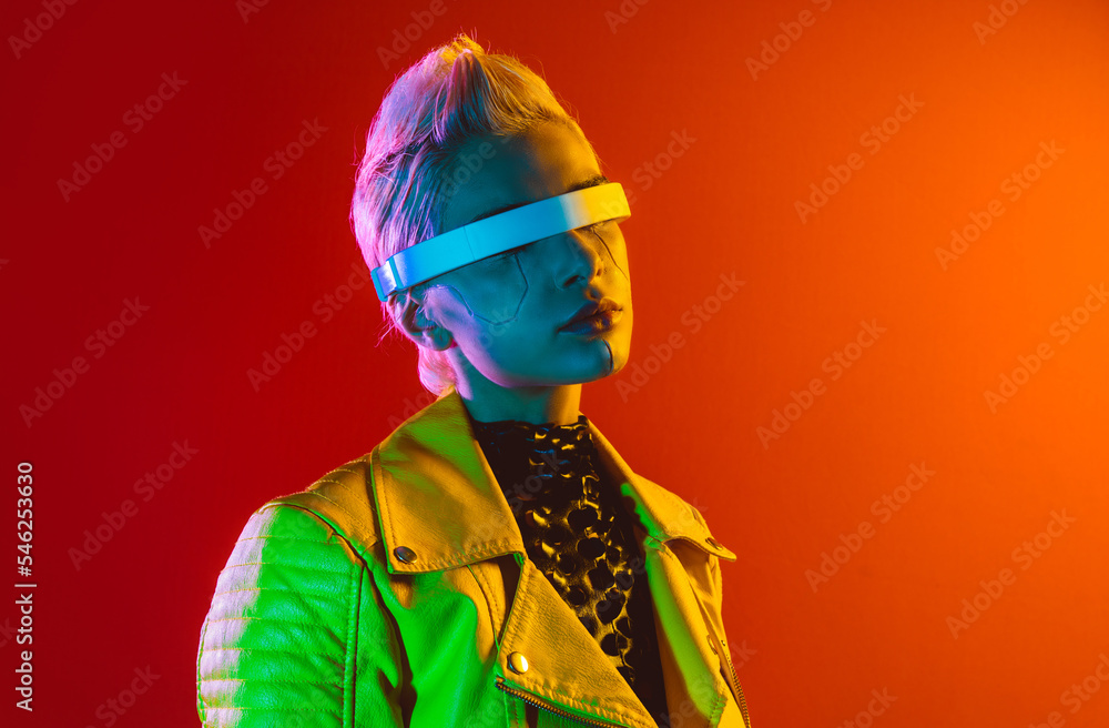 Representation of a bionic super human with advanced technology parts as vr visors and gadgets playing in a mixed reality training room. Futuristic cyberpunk evolution of human mankind and AI Representation of a bionic super human with advanced technology parts as vr visors and gadgets playing in a mixed reality training room. Futuristic cyberpunk evolution of human mankind and AI