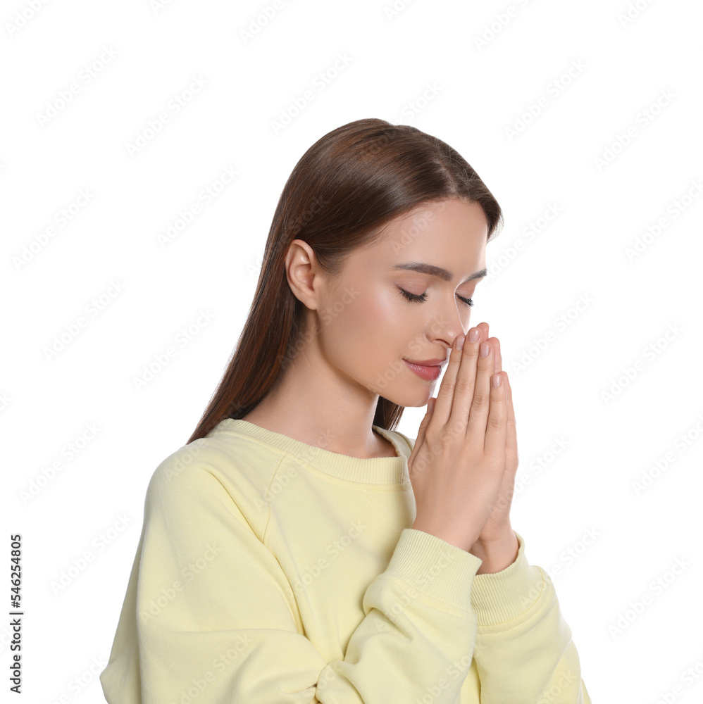 Woman with clasped hands praying on white background Woman with clasped hands praying on white background