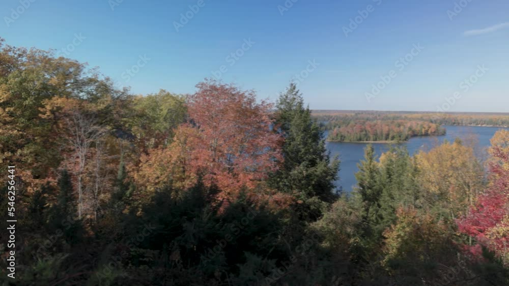 Au Sable River along the River Road National Scenic Byway in Michigan during fall colors with video panning left to right. Au Sable River along the River Road National Scenic Byway in Michigan during fall colors with video panning left to right.