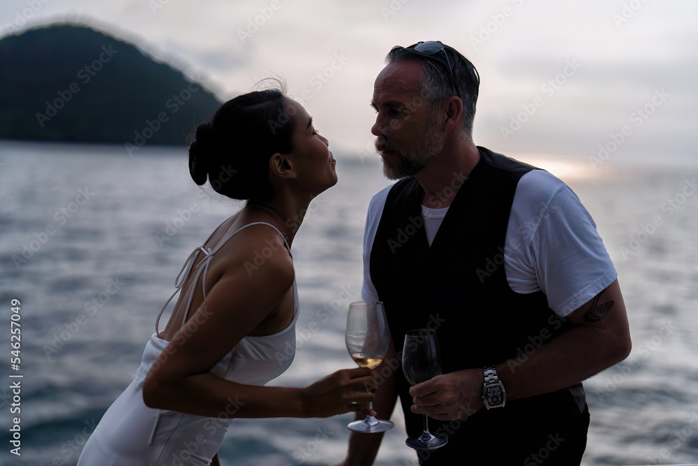 business-man-and-wife-on-holiday-stand-in-the-yacht-deck-freedom