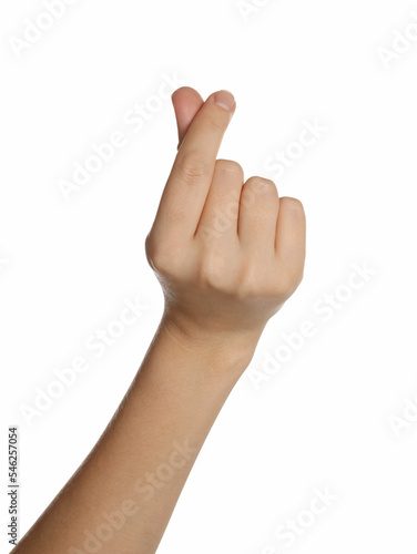 Woman showing heart gesture on white background, closeup of hand