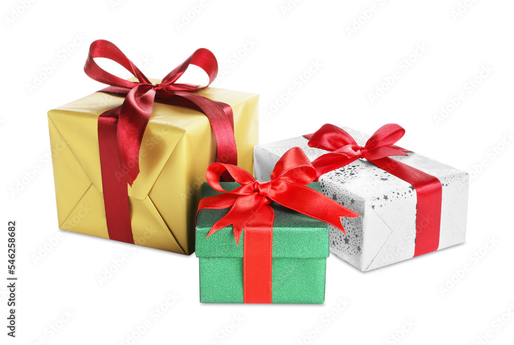 Different Christmas gifts in boxes on white background