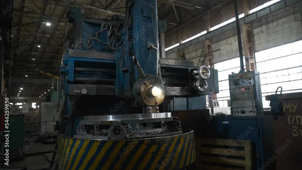 Metal processing on the machine. Production of a specialized product blank. Grinding, turning, preparation of a metal structure. General plan of the factory.. The blacksmith forging hot iron workshop Metal processing on the machine. Production of a specialized product blank. Grinding, turning, preparation of a metal structure. General plan of the factory.. The blacksmith forging hot iron workshop