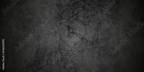 Black stone wall cracked concrete grunge texture and backdrop background anthracite panorama. Panorama dark grey black slate background or texture. © MdLothfor