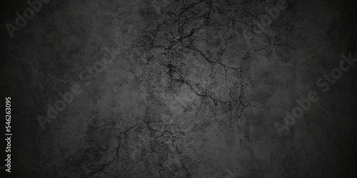 Black stone wall cracked concrete grunge texture and backdrop background anthracite panorama. Panorama dark grey black slate background or texture. 