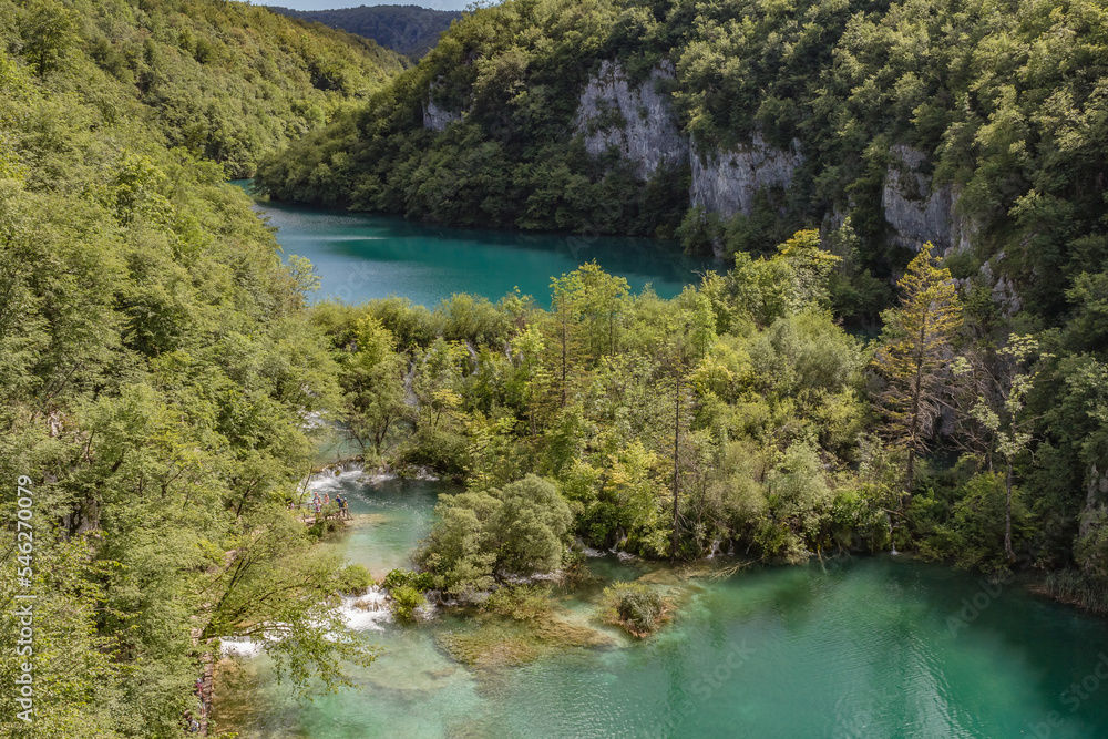 Top view of Plitvice Lakes with waterfalls with crystal clear water in surrounding forest in The Plitvice Lakes National Park in Croatia Europe.