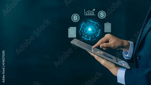 Businessman holding tablet with projected icon on euro online trading screen internet business concept business virtual chart growth report Business Strategic Planning Concepts