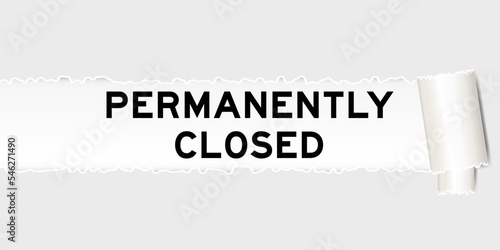 Ripped gray paper background that have word permanently closed under torn part