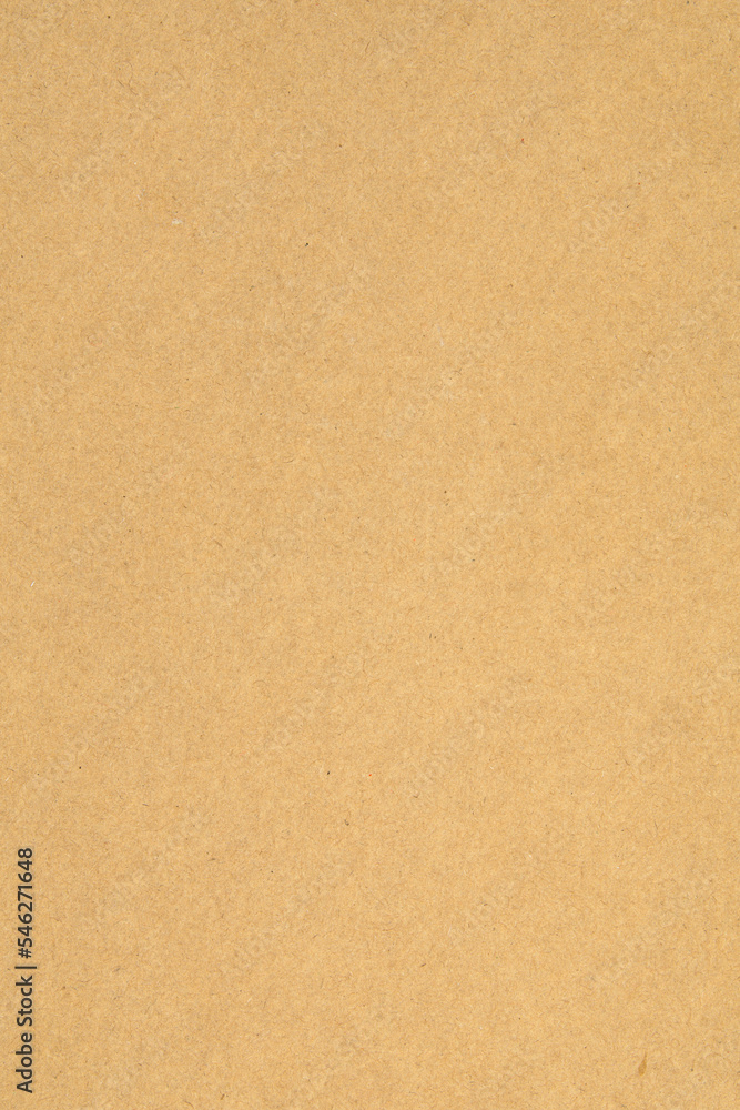 Seamless vertical texture of durable cardboard, detailed surface of yellow recycled cardboard Seamless vertical texture of durable cardboard, detailed surface of yellow recycled cardboard
