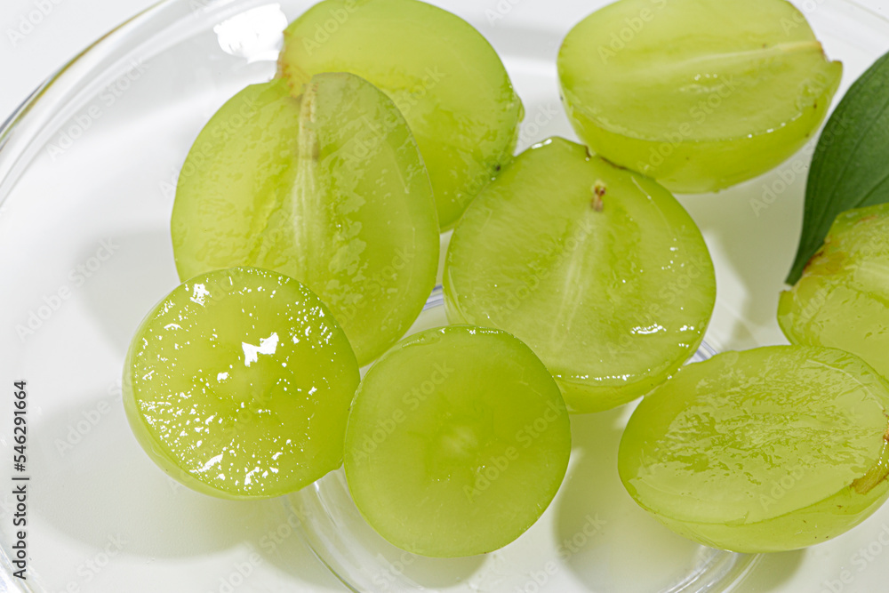 Cut Shine Muscat grapes on a white background. Cut Shine Muscat grapes on a white background.