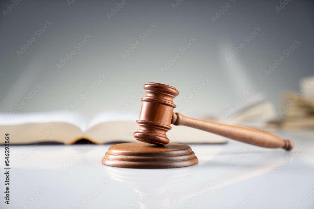 Law and justice concept. Judge office – gavel and legal code on white desk. Law and justice concept. Judge office – gavel and legal code on white desk.