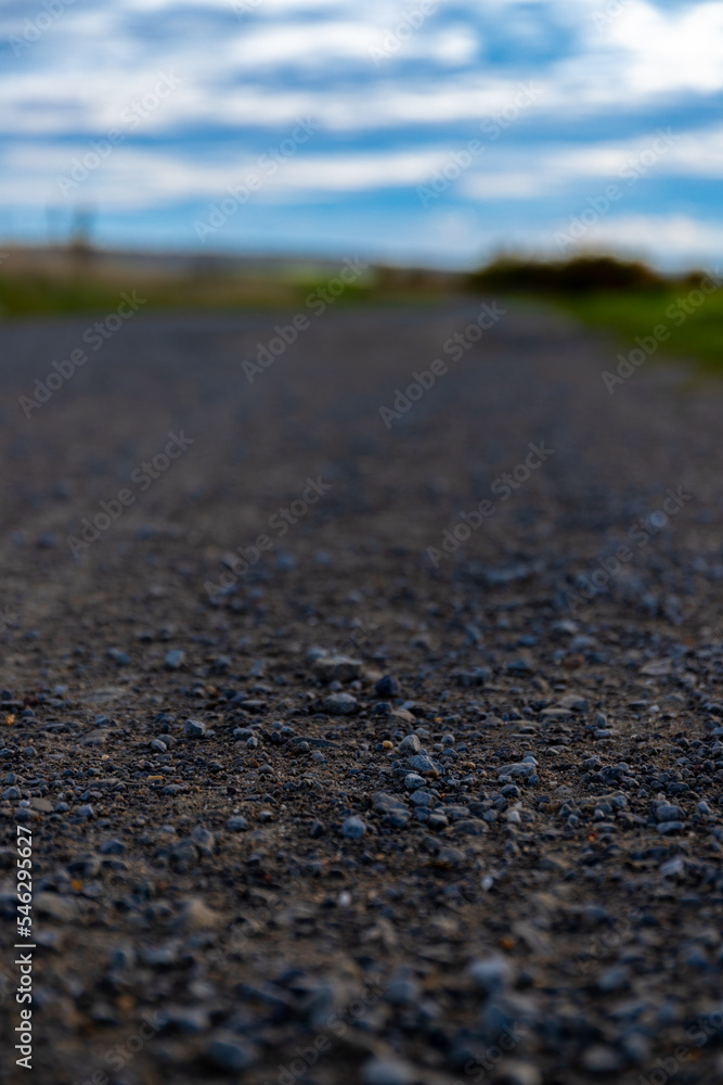 Macro image close to the ground , stones on a dirt road
