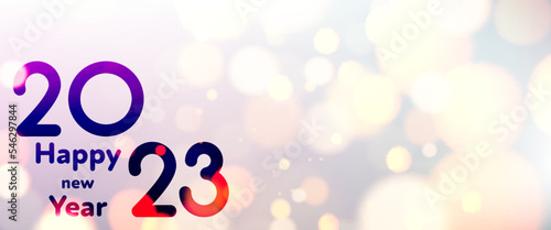 Banner with 2023 happy new year sign on sweaty grass.