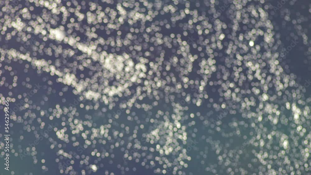 Slowly moving defocused light particles Slowly moving defocused light particles