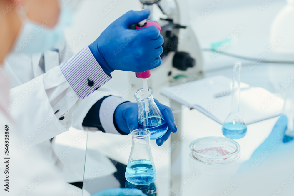 close up. scientists are working on creating a new vaccine. close up. scientists are working on creating a new vaccine.