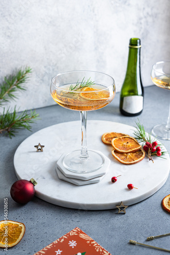 Served christmas table with champagne cocktail