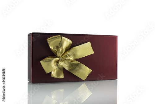 golden bow on red present