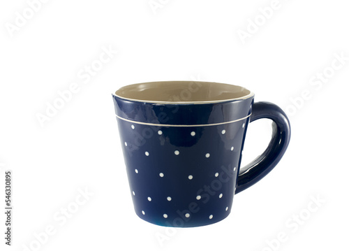 blue cup with white dots for thee or coffee photo