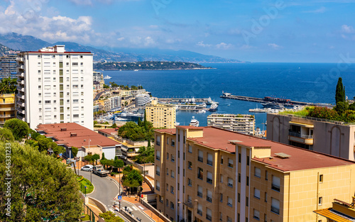 Panoramic view of Monaco metropolitan area with Monte Carlo, Carrieres Malbousquet and Les Revoires quarters over Hercules Port at French Riviera coast © Art Media Factory