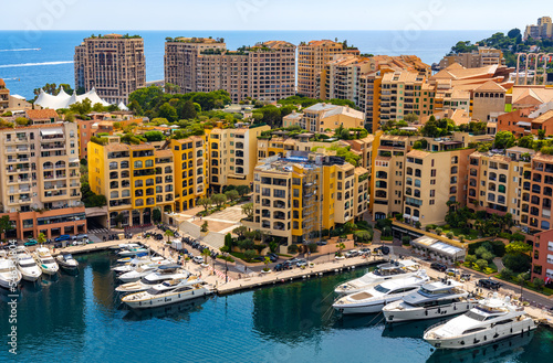 Panoramic view of Monaco metropolitan area with Port Fontvielle yacht marina with surrounding residences at Mediterranean Sea coast © Art Media Factory