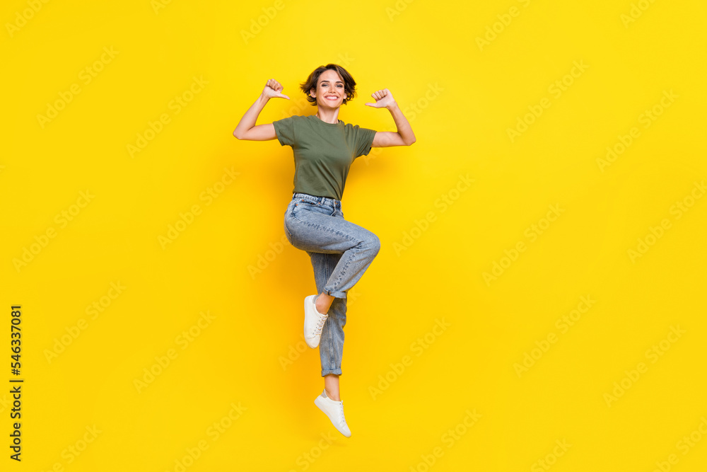 Full length photo of excited cheerful lady dressed stylish clothes direct thumbs herself empty space isolated on yellow color background