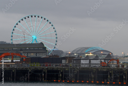 The Seattle ferris wheel during a chilly rainy day in the fall.