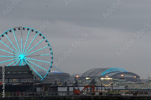 The Seattle ferris wheel during a chilly rainy day in the fall.