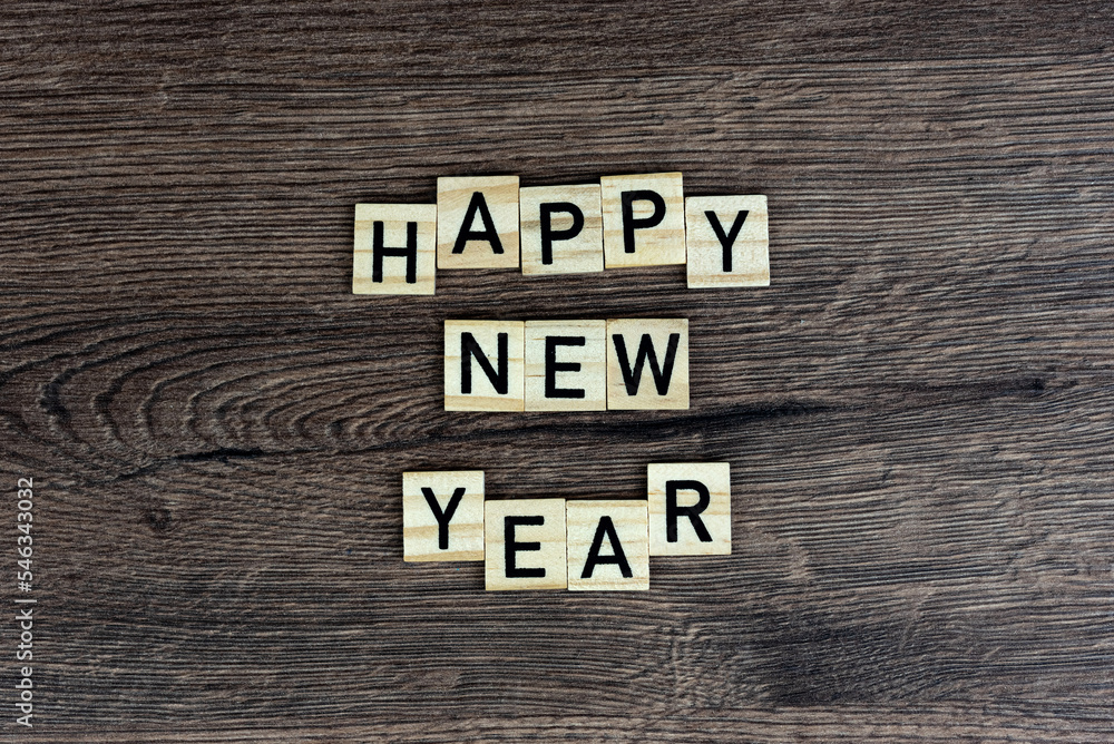 Fototapeta premium Happy New Year - wooden word (wooden letters, wooden sign)