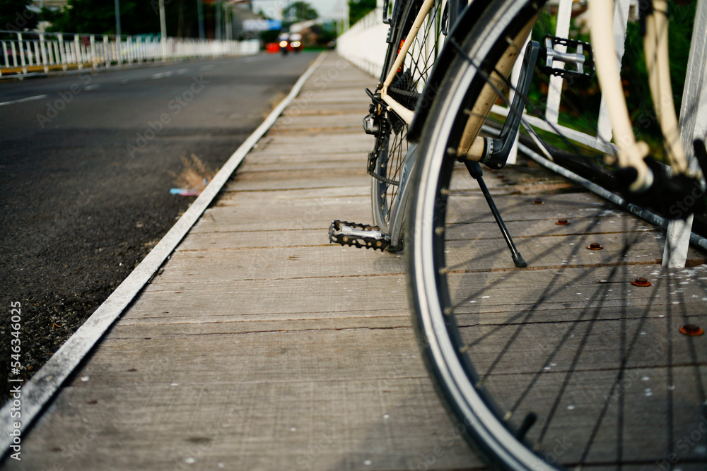 front wheel bicycle on the bridge. banner. copy space