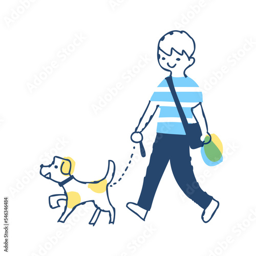 犬の散歩をしている男の子