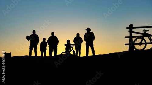 silhouette of a group of people