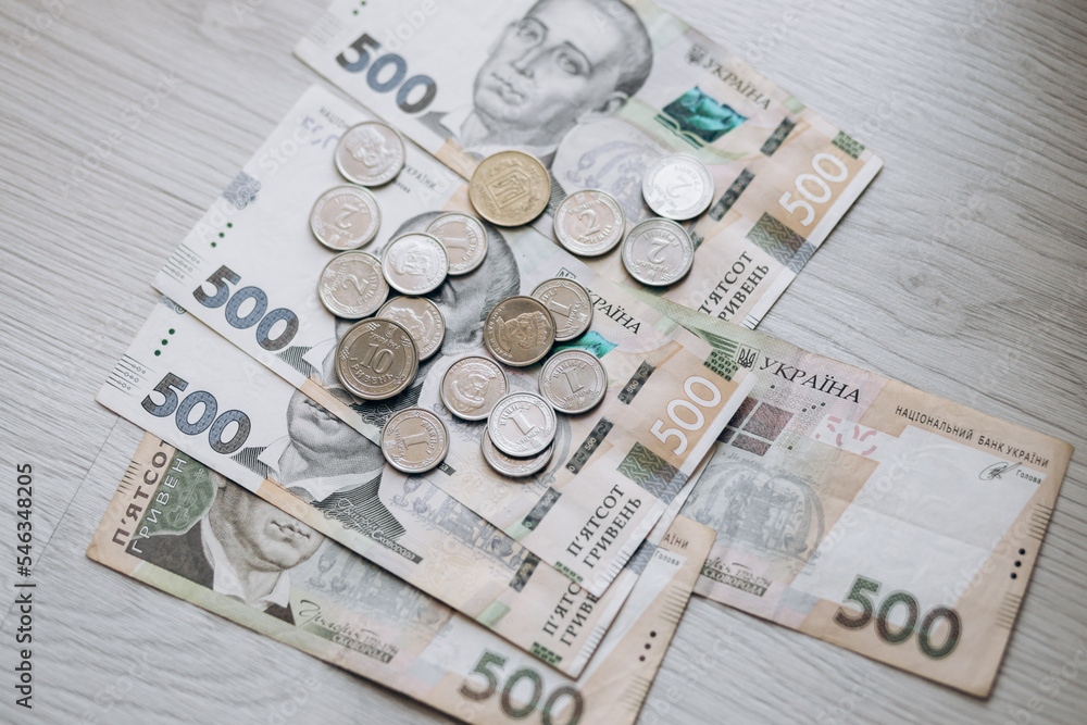 Paper and metal coin money of Ukraine. Currency of Ukraine. Ukrainian hryvnia pennies. 500 hryvnia. Paper and metal coin money of Ukraine. Currency of Ukraine. Ukrainian hryvnia pennies. 500 hryvnia.