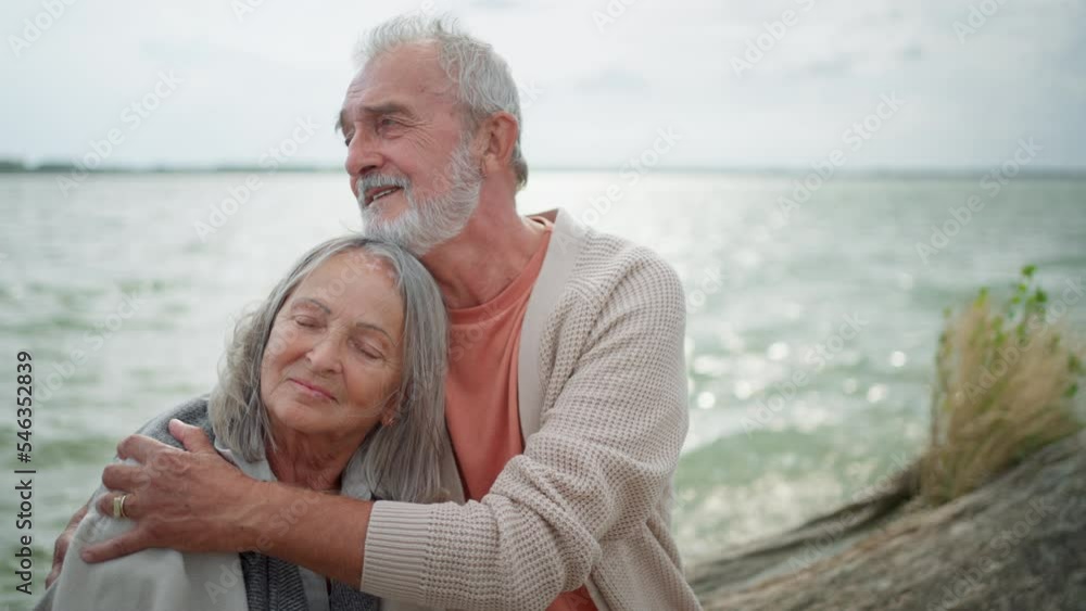 Senior couple enjoying time together at the beach. Senior couple enjoying time together at the beach.