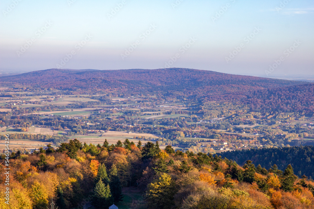 The panorama of the Świętokrzyskie Mountains in autumn from the observation tower of the Holy Cross Basilica