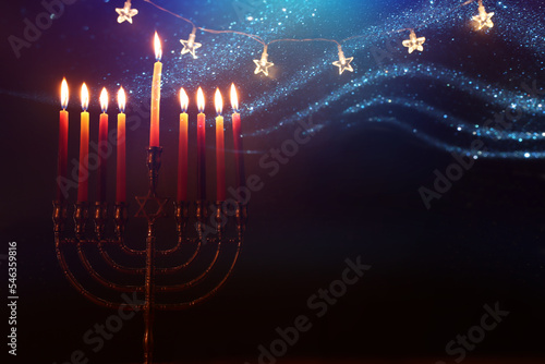 Image of jewish holiday Hanukkah with menorah (traditional candelabra) and candles