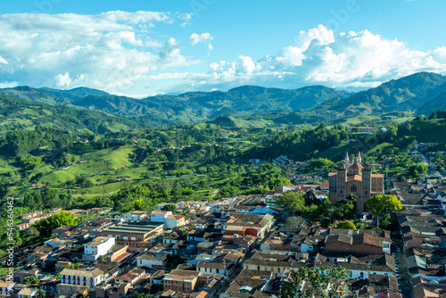 Wide panorama of the superb village (pueblo) of Jerico, antioquia, Colombia, with a blue sky and the Andes Mountains in the background. Picture taken from El Morro El Salvador. photo