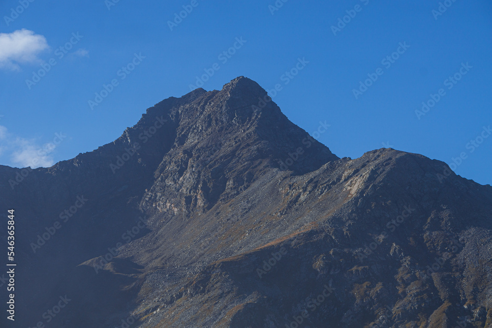 The peaks and glaciers of Engadin, seen from Piz grevasalvas, a peak near the village of Maloja, Switzerland - August 2022.