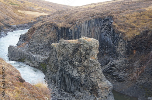 Autumn in the Studlagil Canyon - Basalt Rock Columns and Glacial River Jokuldalur  East Iceland