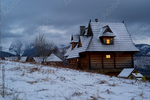 evening beautiful wooden house standing high in the mountains