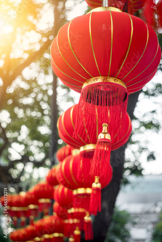 Beautiful round red lanterns hanging in rows during on Chinese lunar new year Celebration festival.