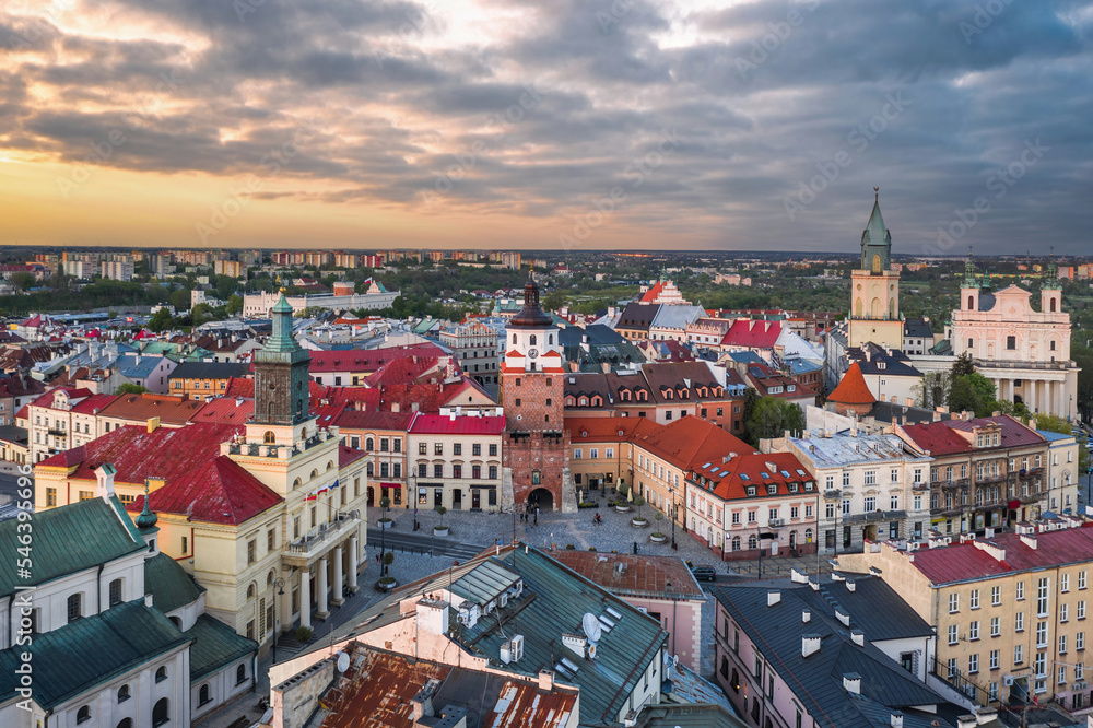 Beautiful panoramic skyline cityscape of Lublin, Lesser Poland. Aerial view of Królewska street and the old town landmarks at sunset: Cracow Gate (Brama Krakowska), Town hall (Ratusz), Cathedral