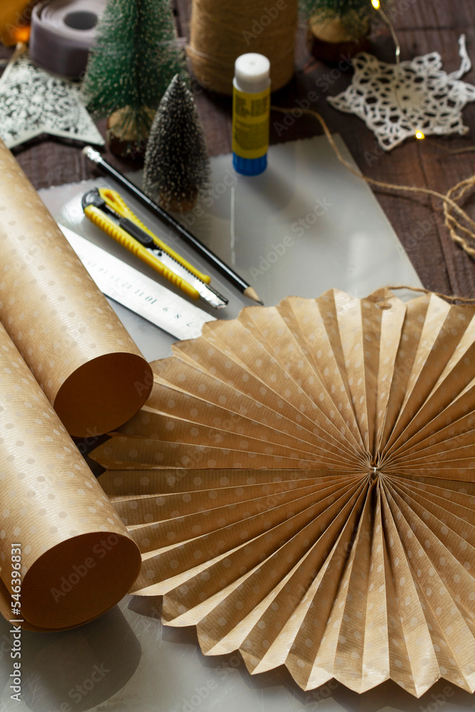 Craft paper star or snowflake for decoration, paper and craft supplies.