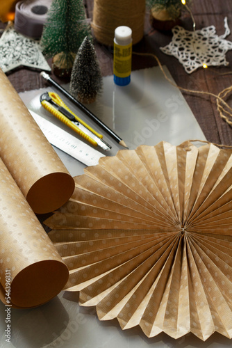 Obraz na płótnie Craft paper star or snowflake for decoration, paper and craft supplies. w salonie