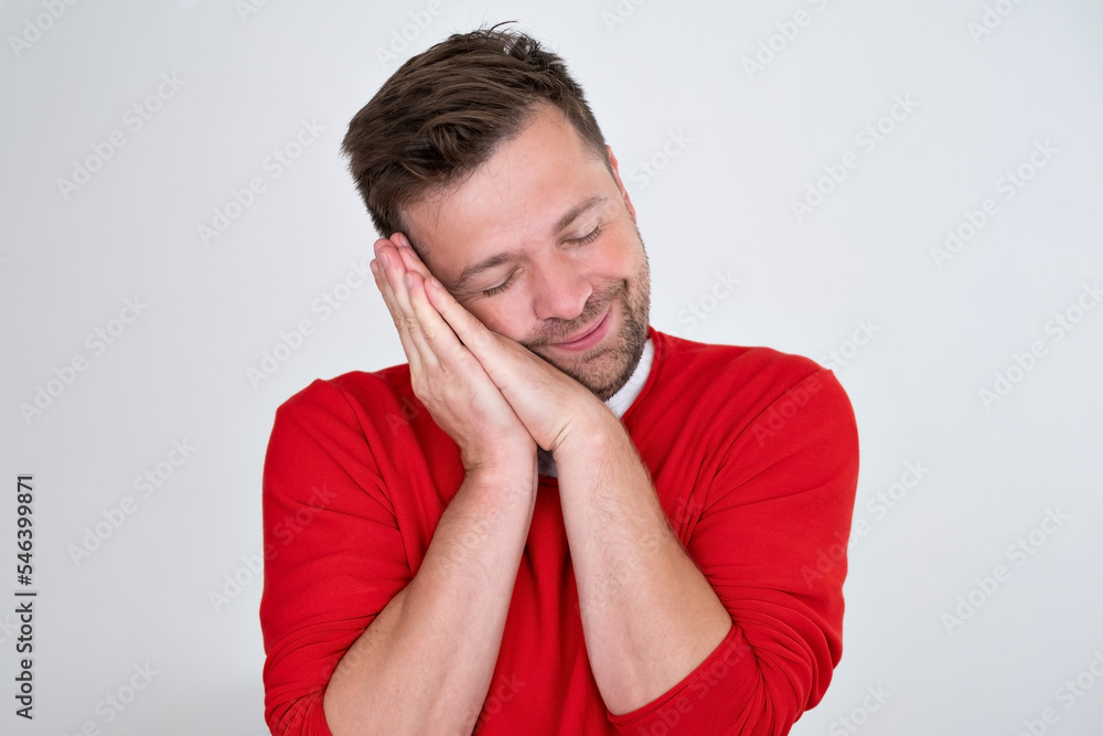 man sleeping tired dreaming and posing with hands together man sleeping tired dreaming and posing with hands together