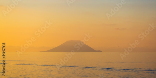 Stromboli Island with an Active Volcano in Tyrrhenian Sea. Italy. Sunny Morning Sunrise Sky. Nature Background